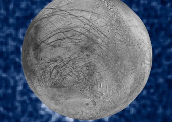 This composite image released by NASA shows suspected plumes of water vapor erupting off the limb of Jupiter's moon Europa. Picture: Getty