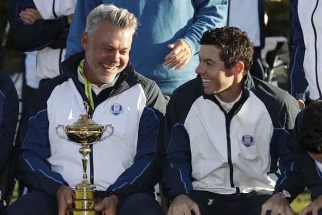 Europe captain Darren Clarke and Rory McIlroy pose with the trophy before a practice round for the Ryder Cup at Hazeltine. Picture: AP