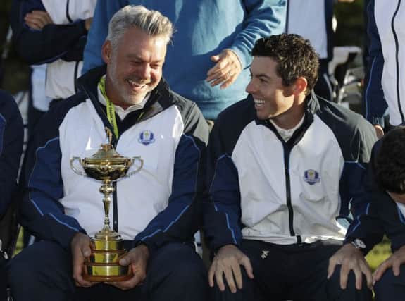 Europe captain Darren Clarke and Rory McIlroy pose with the trophy before a practice round for the Ryder Cup at Hazeltine. Picture: AP