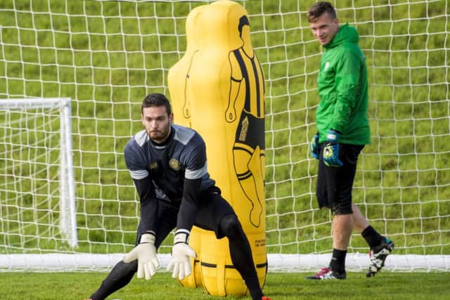 Dorus de Vries keeps an eye on Celtic's Craig Gordon in training. Picture: Craig Williamson/SNS