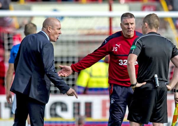 Rangers manager Mark Warburton makes his feelings known to referee John Beaton. Picture: SNS