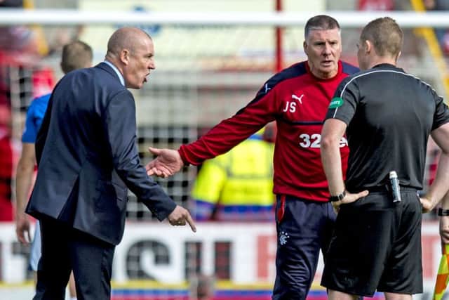Rangers manager Mark Warburton makes his feelings known to referee John Beaton. Picture: SNS