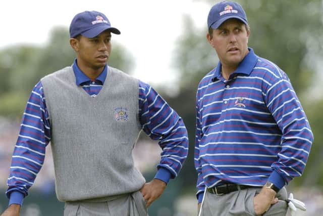 Tiger Woods and Phil Mickelson failed to spark as a pairing in Hal Sutton's USA team at the 2004 Ryder Cup at Oakland Hills. Picture: Al Messerschmidt/WireImage
