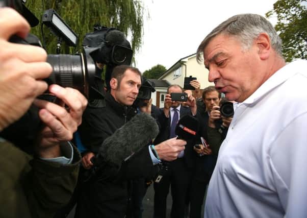 Former England manager Sam Allardyce speaks to the media as he leaves his home in Bolton. Picture: Dave Thompson/Getty