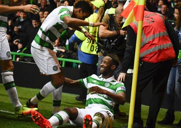 Moussa Dembele celebrates putting Celtic 3-2 ahead but Manchester City fought back to level the match 3-3. Picture: Rob Casey/SNS