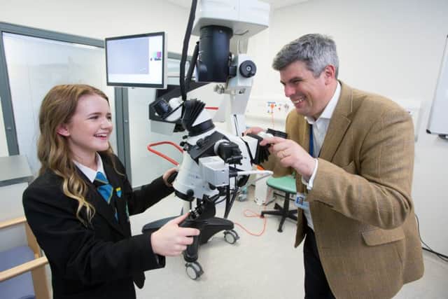 Hospital ambassador Jenny Cook with Craig Russell, lead for paediatric plastic surgery. Picture: Martin Shields/Contributed