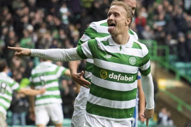 Celtic's Leigh Griffiths can't stop scoring when he plays. But has he fallen behind Moussa Dembele in the pecking order? Picture: SNS