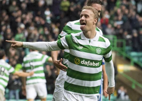 Celtic's Leigh Griffiths can't stop scoring when he plays. But has he fallen behind Moussa Dembele in the pecking order? Picture: SNS