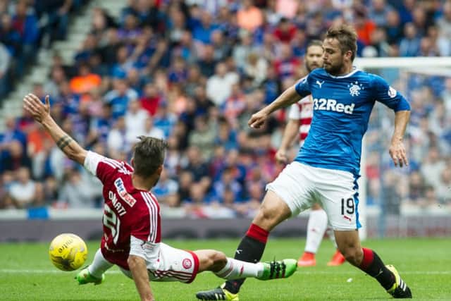 Niko Kranjcar, right, has been shocked by the level of media scrutiny Rangers are subjected to, says Mark Warburton. Picture: John Devlin