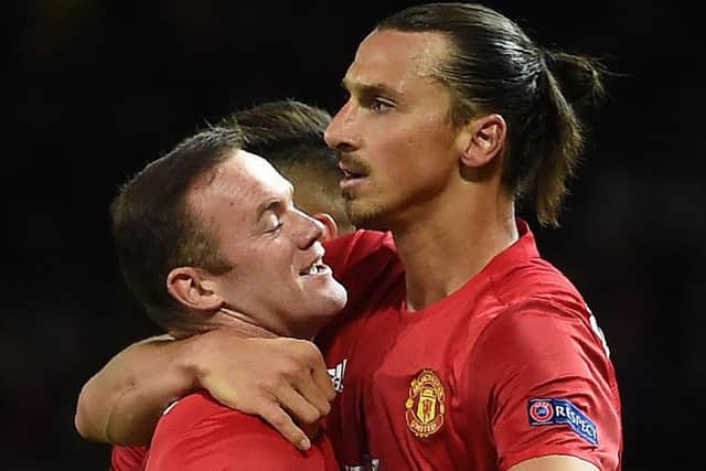Manchester United's Swedish striker Zlatan Ibrahimovic celebrates scoring his team's winner with Wayne Rooney. Picture: AFP/Getty Images