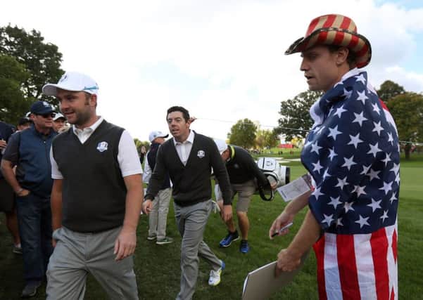Europe's Andy Sullivan and Rory McIlroy makes their way back onto the sixth hole during a practice session ahead of the 41st Ryder Cup at Hazeltine. Picture: David Davies/PA Wire