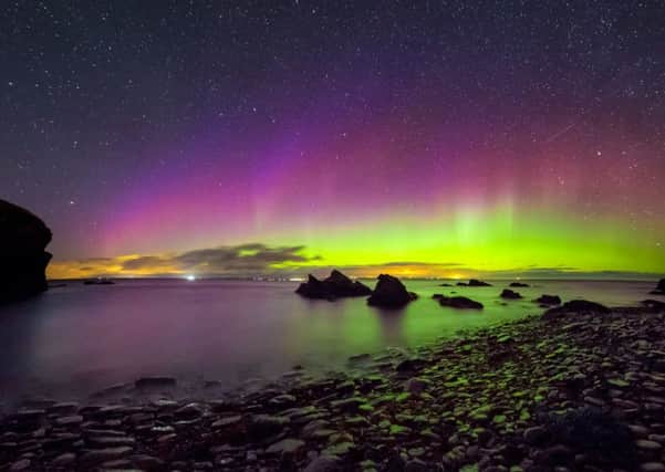 The Northern Lights and Milky Way over Noss Head in Caithness. Picture: Maciej Winiarczyk