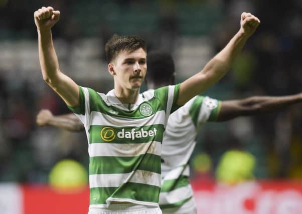 Kieran Tierney celebrates at full-time having put in a fine performance against Manchester City. Picture: SNS.