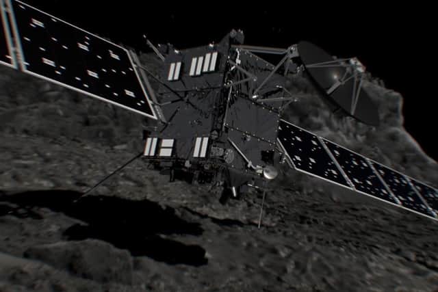 Undated handout artist's impression issued by ESA showing Rosetta shortly before hitting Comet 67P/ChuryumovGerasimenko.