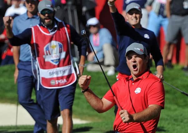 Team USA's Patrick Reed celebrat evictory over  Henrik Stenson and Justin Rose during the first day  at Hazeltine. Picture: Thomas J. Russo