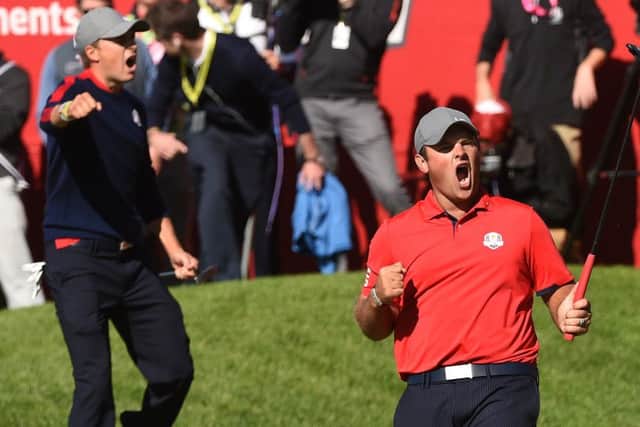 Patrick Reed, right, and Jordan Spieth celebrate after beating Justin Rose and Henrik Stenson in the first match at Hazeltine. Picture: Getty Images