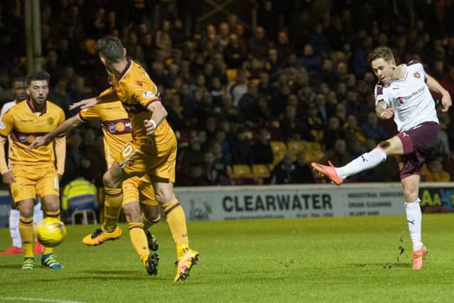 Sam Nicholsons shot is on its way to the Motherwell net, with the aid of a deflection. Picture: SNS.