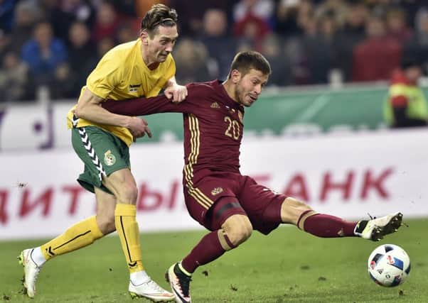 Former Hearts star Deividas Cesnauskis, left, is still playing for his country