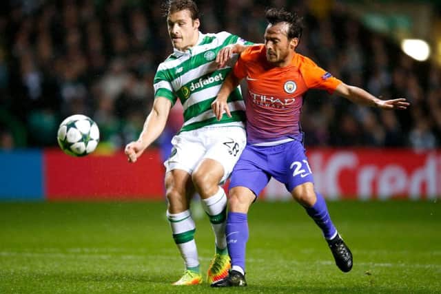 Manchester City's David Silva (right) and Celtic's Erik Sviatchenko battle for the ball during the UEFA Champions League, Group C match at Celtic Park, Glasgow. PRESS ASSOCIATION Photo. Picture date: Wednesday September 28, 2016. See PA story SOCCER Man City. Photo credit should read: Jane Barlow/PA Wire