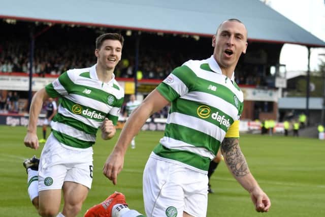 Celtic's Scott Brown celebrates having scored the game's only goal