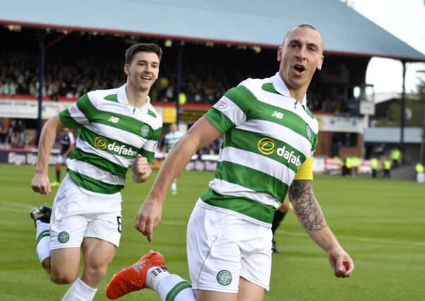 Celtic's Scott Brown celebrates having scored the game's only goal