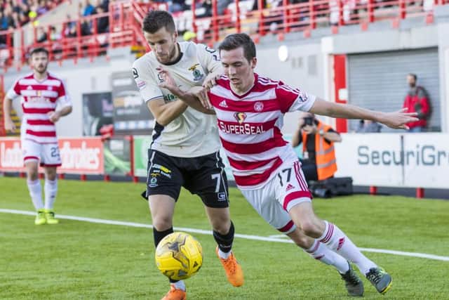 Hamilton's Louis Longridge (right) battles for the ball against Inverness CT's Liam Polworth. Picture: SNS