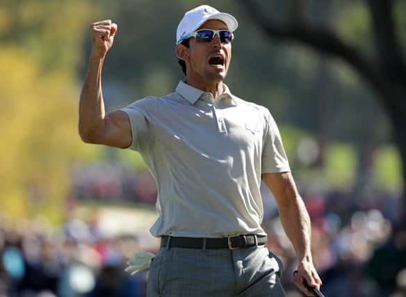 Rafa Cabrera Bello shouts out after holing a birdie putt at the 17th in the Ryder Cup at Hazeltine. Picture: Getty Images