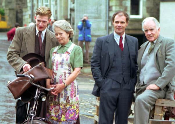 Jason Flemyng, Annette Crosbie (Janet), Ian Bannen (Dr Cameron) and David Rintoul pose during filming of Doctor Finlay, the remake of Dr Finlay's Casebook, in Auchtermuchty in Fife, July 1992.
