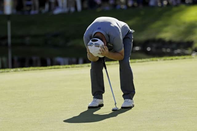 Europe's Andy Sullivan reacts after missing his putt on the 15th hole during a singles match with Brandt Snedeker. Picture: David J. Phillip/AP