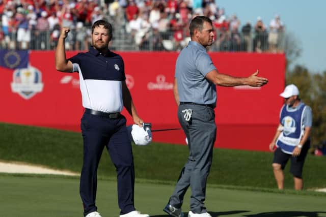 USA's Ryan Moore celebrates winning his round and the Ryder Cup for the USA during the singles match with Lee Westwood. Picture: David Davies/PA Wire