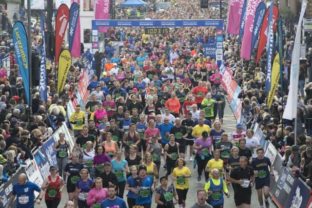 Runners leave George Square at the start of the 10k race. Picture: John Linton/PA Wire