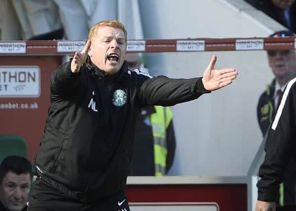 Neil Lennon barks instructions from the dugout. Picture: Greg Macvean
