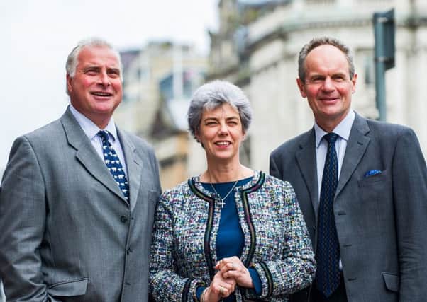 New CKD Galbraith chief executive Pam Over with outgoing boss Tim Kirkwood, left, and chairman Iain Russell. Picture: Stuart Nicol