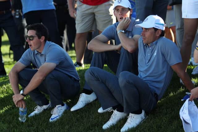 European trio, from left, Rory McIlroy, Thomas Pieters and Rafael Cabrera-Bello cut dejected figures after the defeat.