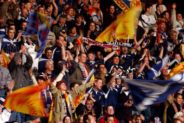The roar of the crowd is mightier than piped in 'goal music'. Picture: Neil Hanna