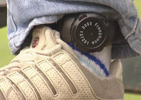An electronic tag on an offender's ankle. Picture: PA wire