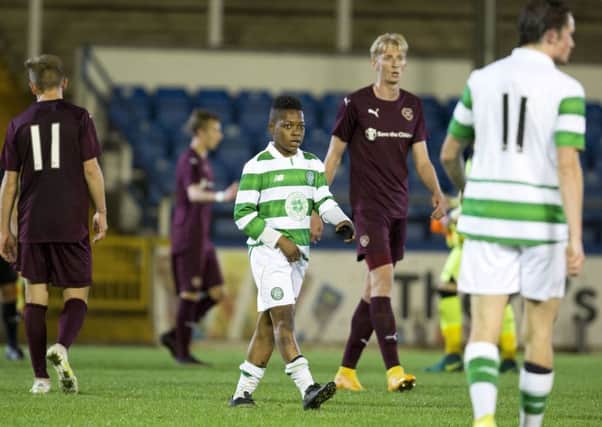 13-year-old Karamoko Dembele, centre, in action for Celtic under-20s against Hearts. 

Picture: Jamie Williamson