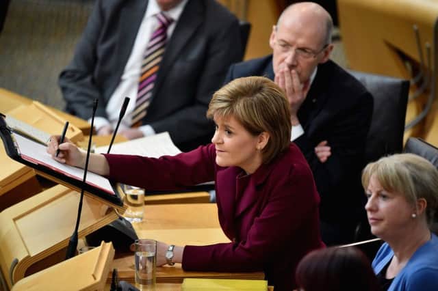 First Minister Nicola Sturgeon might have to adopt a new approach given the opposition her party is now encounterning in Holyrood. Picture: Getty Images