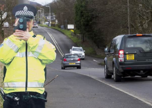 Pop-Up Bob, a life size cut out of a Police officer with speed camera in the village of Lundin Links, Fife. Picture: SWNS