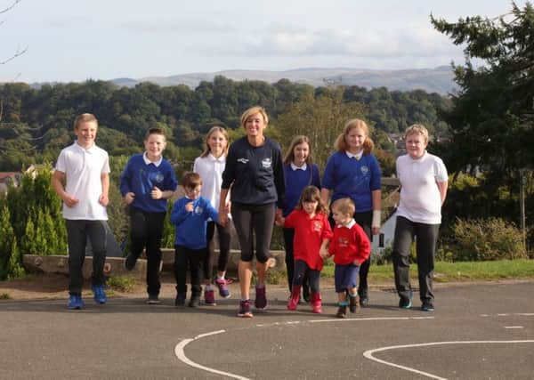 Liz ran the Daily Mile with children from P7 and the school nursery. Picture: Angus Forbes