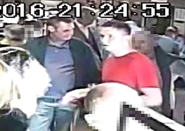 Two men detectives would like to speak to following a serious assault. Picture: PA
