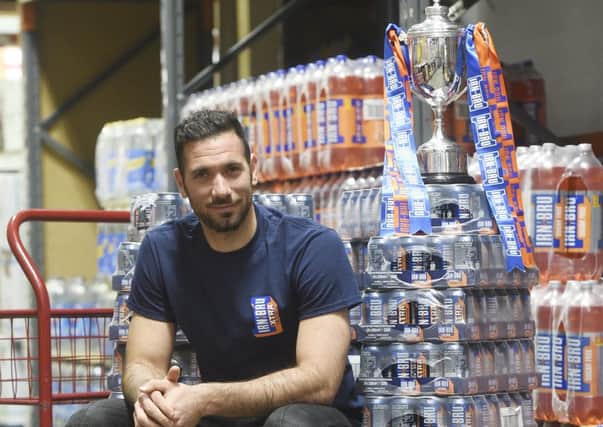 Hibs goalkeeper Ofir Marciano promoting the Irn Bru Cup at Batley's Bellevue Cash and Carry. Picture: Greg Macvean