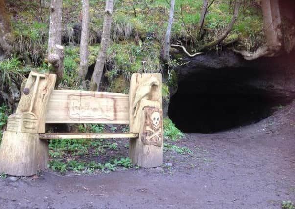The "black mouth" cave near Bridge of Allan which is now marked by a Treasure Island-inspired bench. PIC Kirsty Towner/Twitter