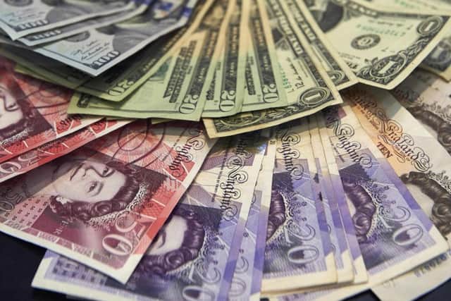 The falling pound helped drive the FTSE 100 close to a record high on the day the pound fell to its lowest level against the US dollar since 1985. Picture: Niklas Halle/AFP/Getty Images