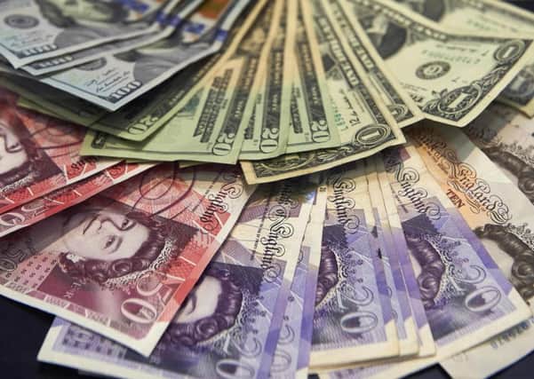 The falling pound helped drive the FTSE 100 close to a record high on the day the pound fell to its lowest level against the US dollar since 1985. Picture: Niklas Halle/AFP/Getty Images