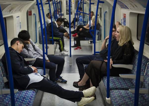 A campaign to get passengers on London tubes to talk to each other was met by a counter campaign whose advocates wore badges saying: "Don't even think about talking to me". Picture Getty Images