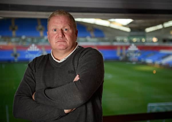 Former Bolton Wanderers and Scotland striker John McGinlay at the Trotters' Macron stadium. Picture: Matthew Pover