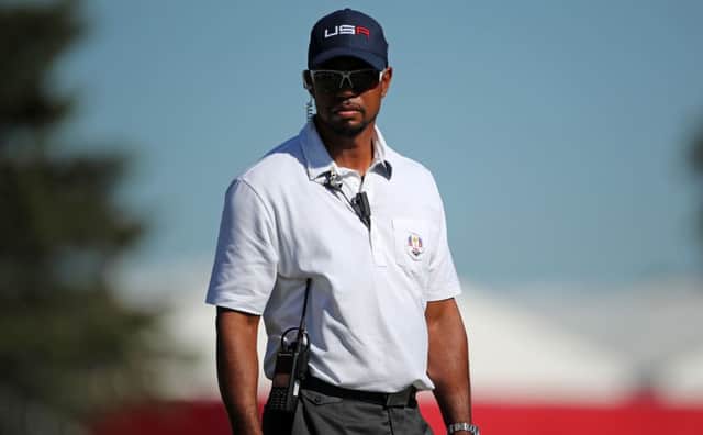USA vice captain Tiger Woods during the singles matches on day three of the 41st Ryder Cup at Hazeltine National Golf Club in Chaska, Minnesota, USA. PRESS ASSOCIATION Photo. Picture date: Sunday October 2, 2016. See PA story GOLF Ryder. Photo credit should read: Peter Byrne/PA Wire. RESTRICTIONS: Use subject to restrictions. Editorial use only. No commercial use. Call +44 (0)1158 447447 for further information.