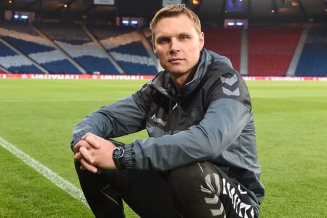Lithuania manager Edgaras Jankauskas put his players through their paces at Hampden. Picture: Craig Foy/SNS
