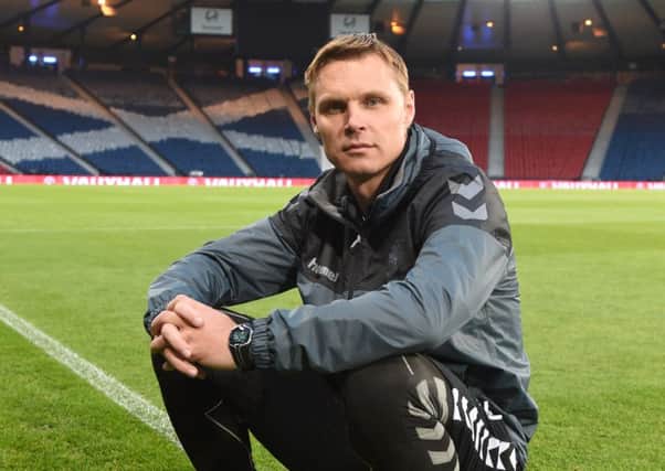 Lithuania manager Edgaras Jankauskas put his players through their paces at Hampden. Picture: Craig Foy/SNS